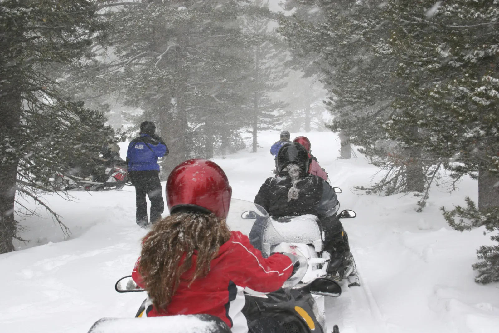 Family snowmobiling in Two Harbors